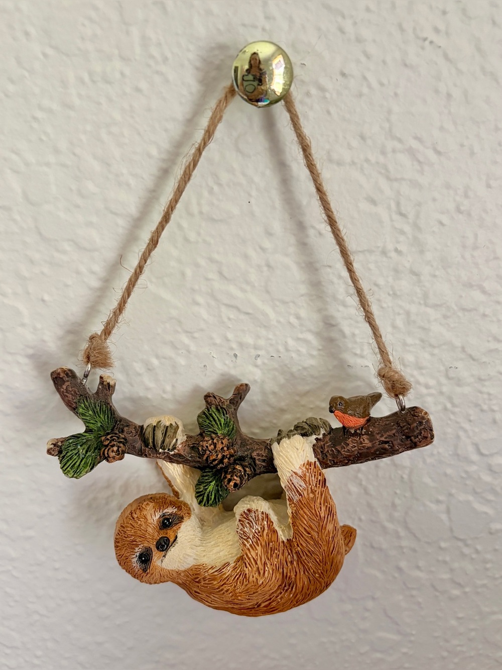 Hobby Lobby sloth-on-a-branch hanging Christmas ornament winter pinecones bird